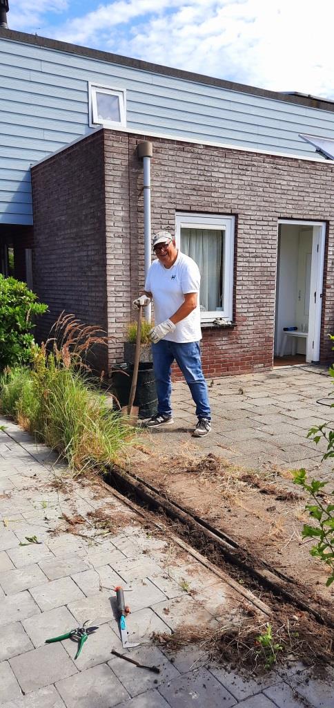 Gartenarbeit im Holland-Häuschen